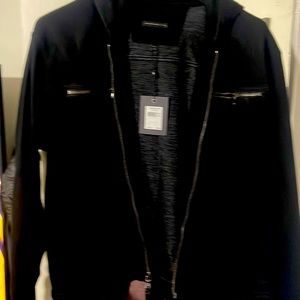 New black Jean jacket with hoodie never worn